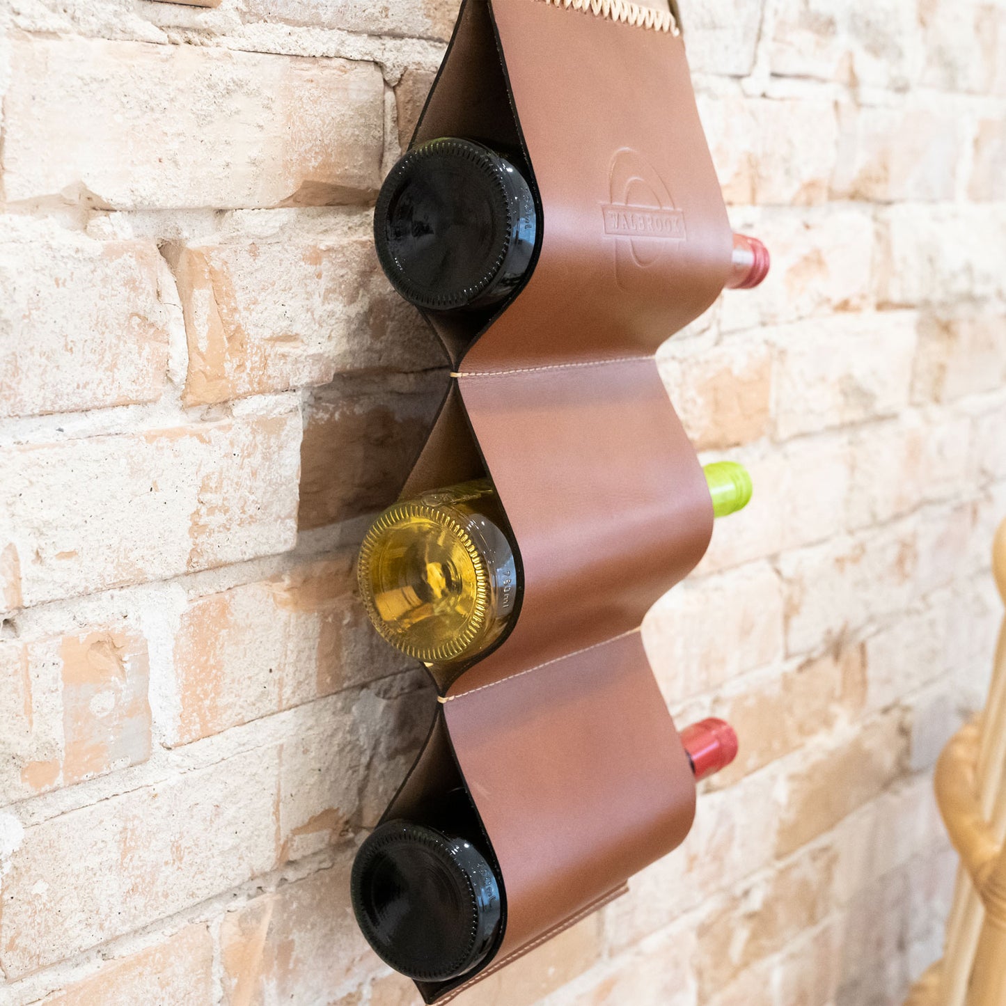 hanging leather wine rack