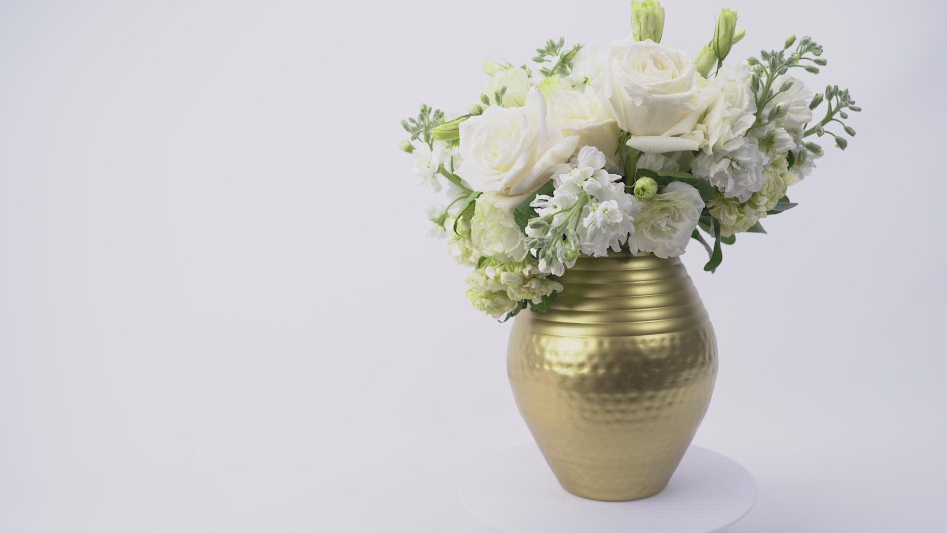 round gold metal flower vase